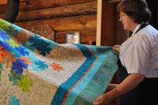 Juananne with Ev Butermans Quilt.JPG